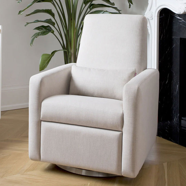 Monte Grano Glider Recliner in front of a plant in -- Color_Dune