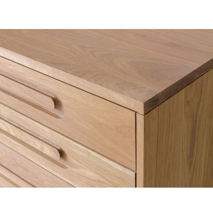 Closeup of right corner of Kalon Caravan Dresser in -- Color_White Oak