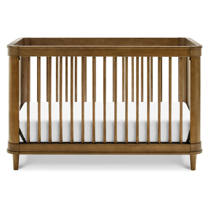 Front view of The Namesake Marin 3-in-1 Convertible Crib in -- Color_Natural Walnut with Blonde Cane