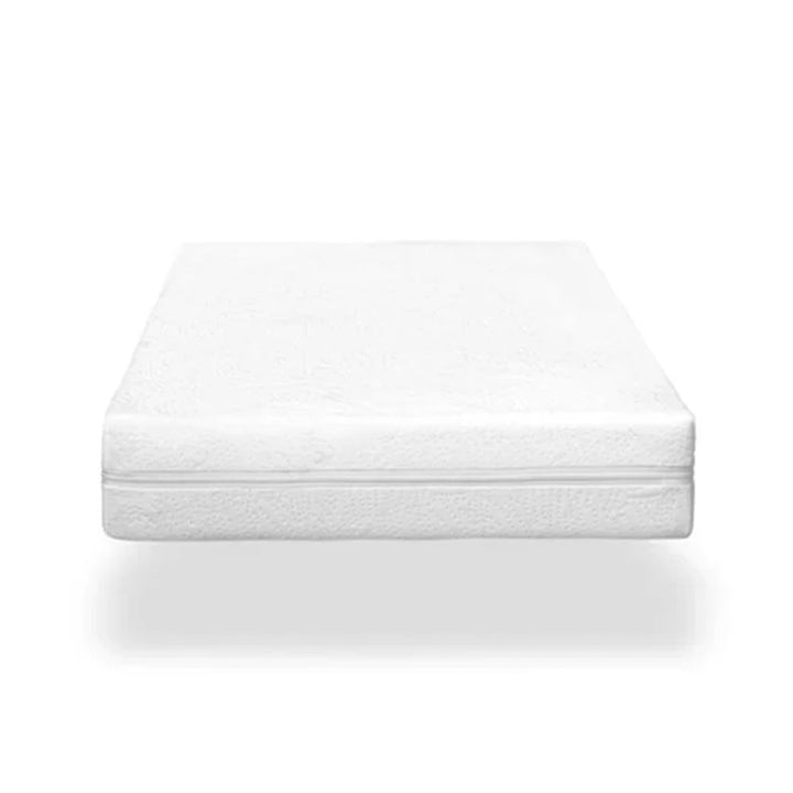 Front view of Oeuf Dual Firm Crib Mattress with zipper 