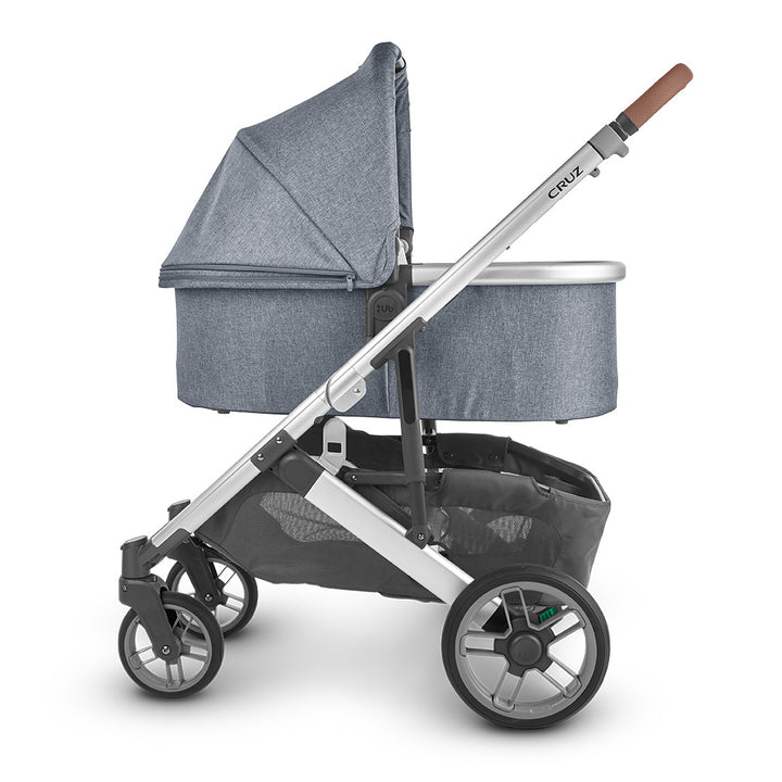 Side view of reversed bassinet on UPPAbaby Cruz V2 Stroller in -- Color_Gregory