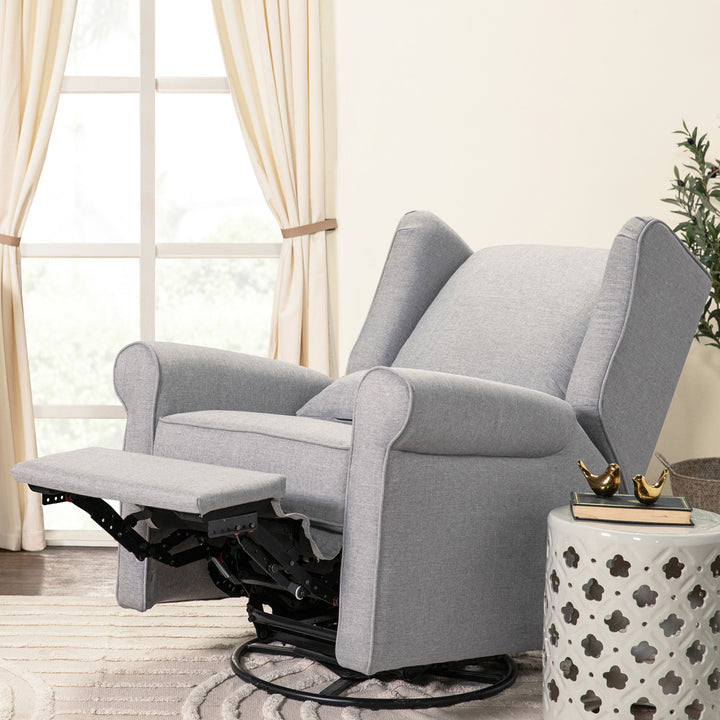 Reclined DaVinci Hayden Recliner & Swivel Glider next to a window in -- Color_Misty Grey