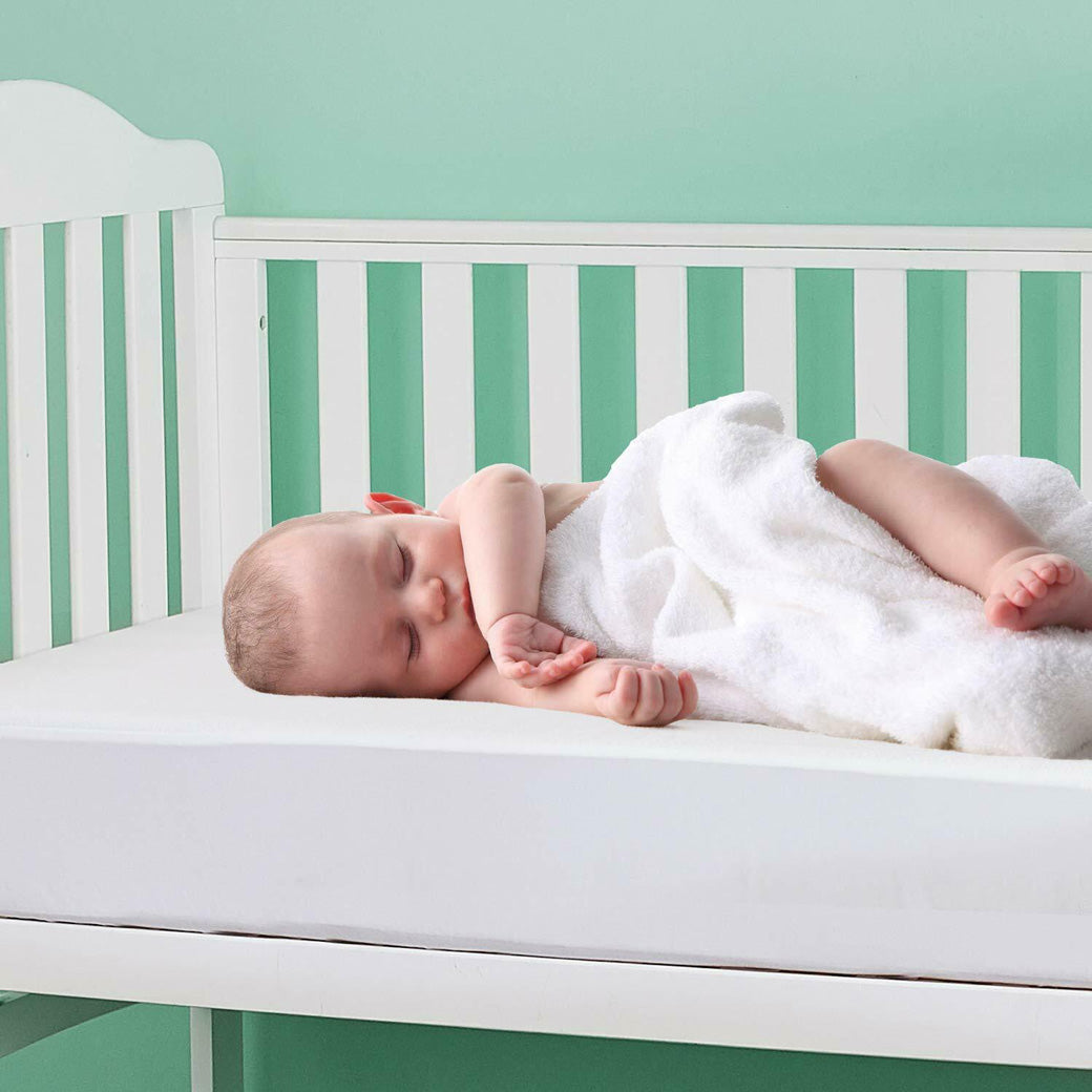 Organic cot mattress discount protector