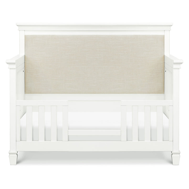 Front view of Darlington 4-in-1 Convertible Crib in Warm White as toddler bed