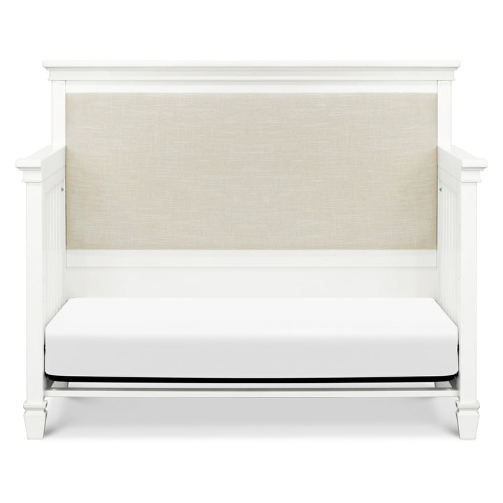 Front view of Darlington 4-in-1 Convertible Crib in Warm White as daybed