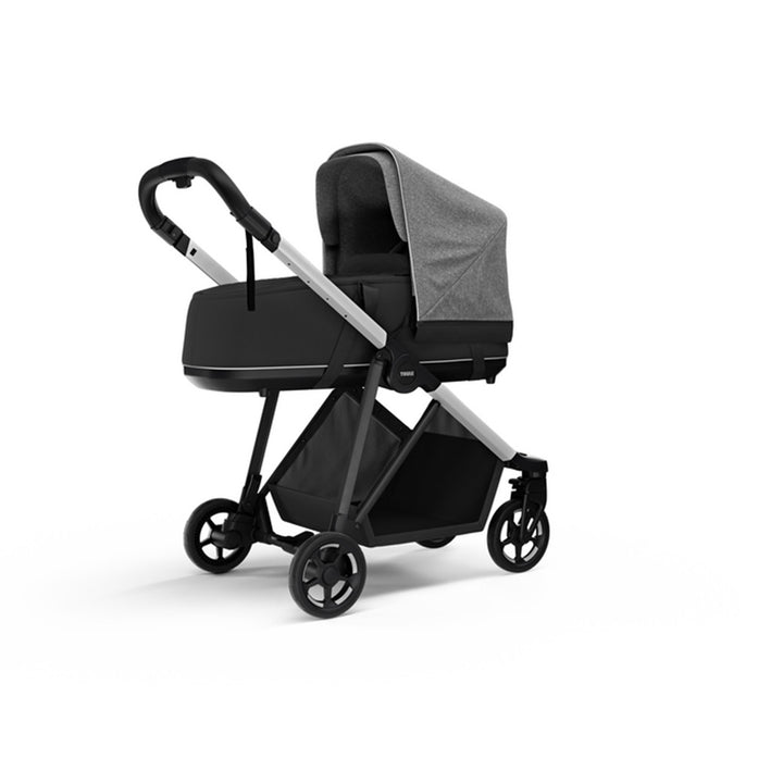 Side view of the Thule Shine Bassinet on the Thule Shine Stroller in -- Color_Grey Melange