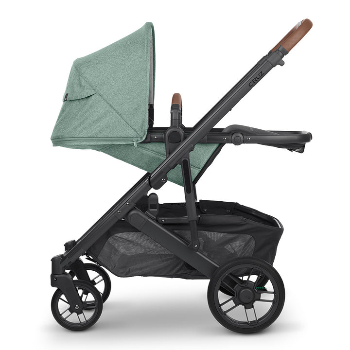 Side view of reversed UPPAbaby Cruz V2 Stroller fully reclined  in -- Color_Gwen