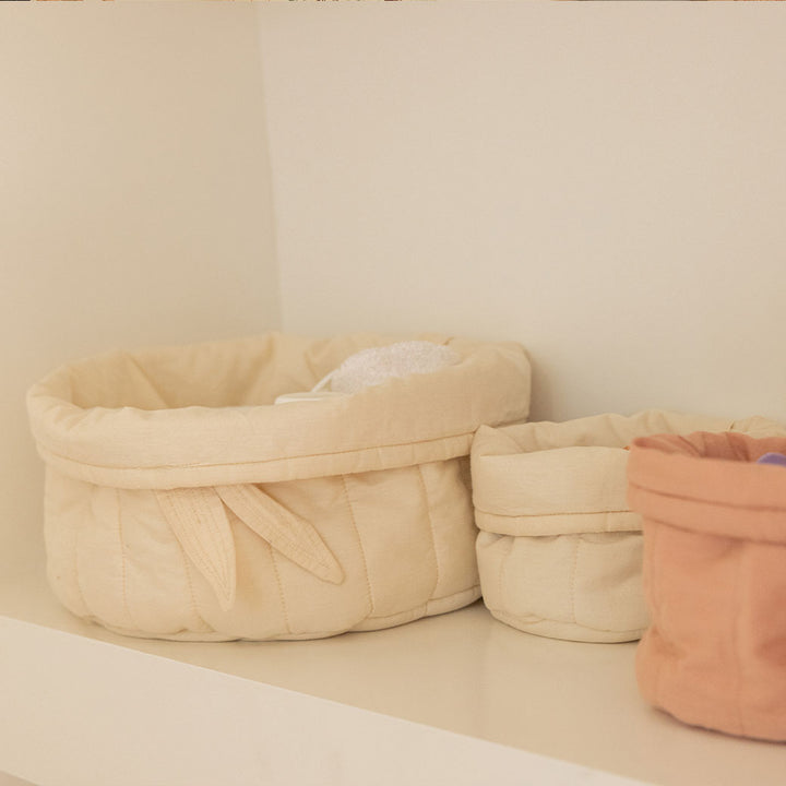 Lorena Canals Bambie Quilted Baskets on a shelf closeup in -- Color_Natural