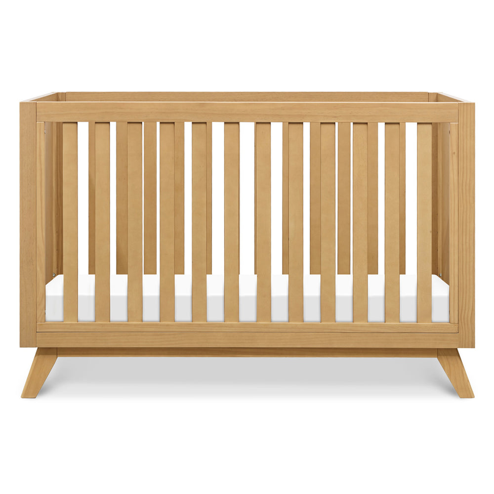 Front view of DaVinci Otto 3-in-1 Convertible Crib in -- Color_Honey _ Wood