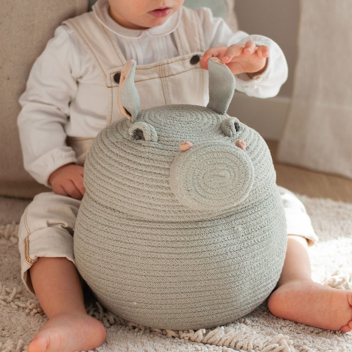 A child playing with the Lorena Canals Henry the Hippo Basket