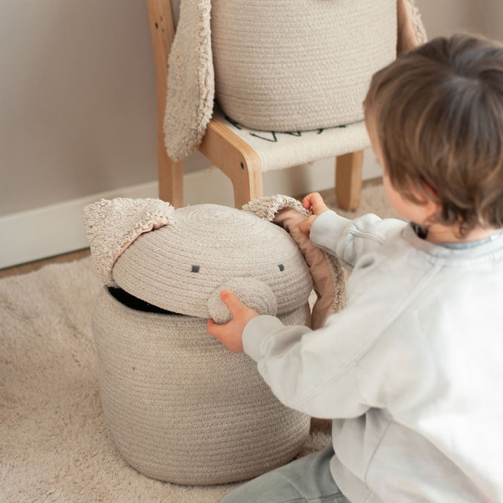 A child playing with the Lorena Canals Rita the Rabbit Basket